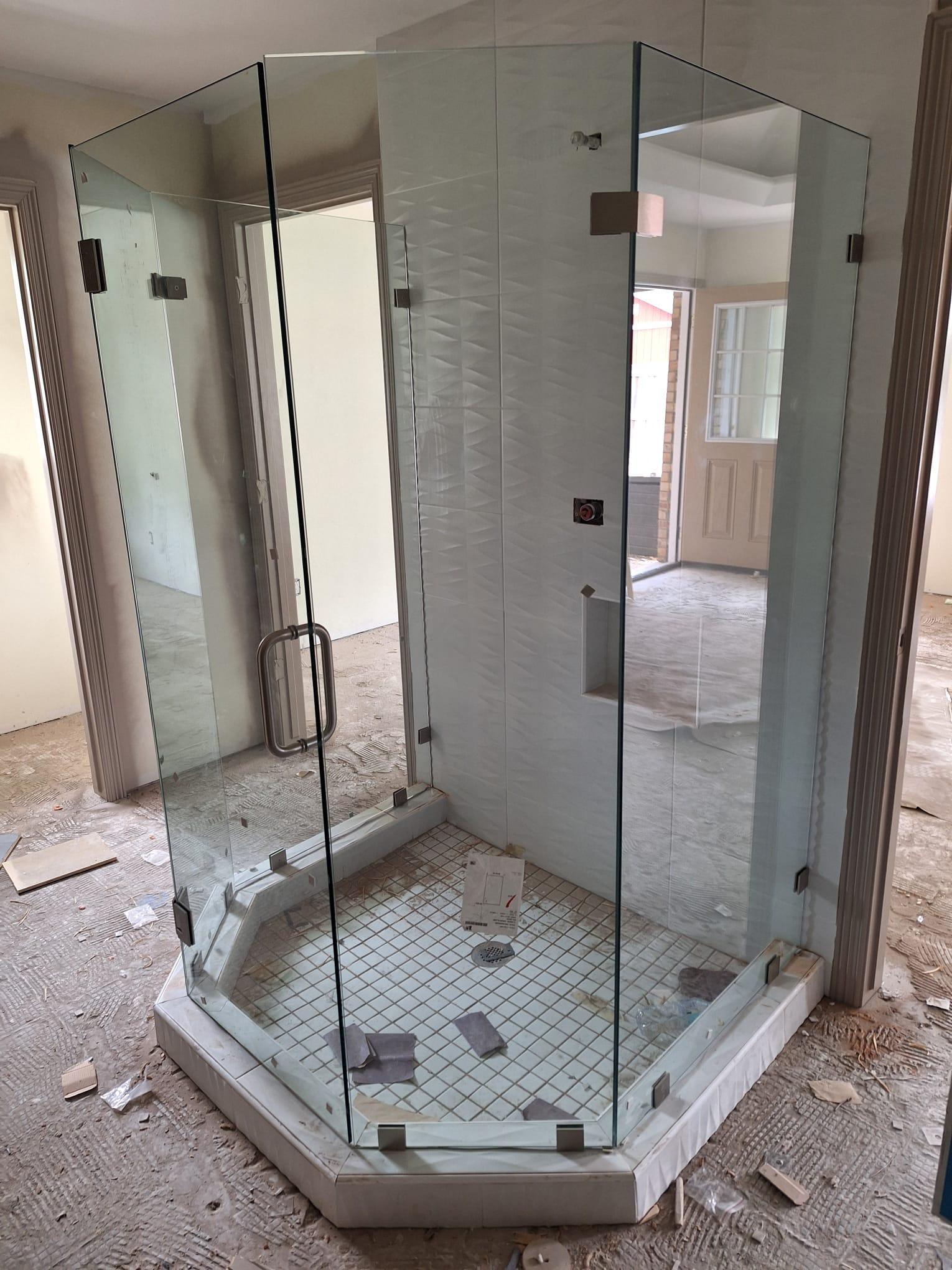 Corner shower enclosure